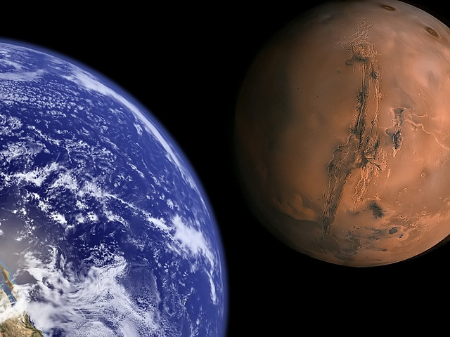 Photo:Earth and Mars to scale. By:Bluedharma