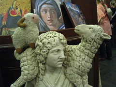 Youssouf with a replica of a sheep statue in a shop of the Vatican Museums  - Vatican City, Rome, Italy - 10 August 2006