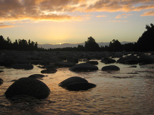 sunset newzealand river rocks southisland westcoast