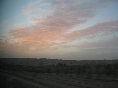 2005 china travel cloud bus window sunrise desert xinjiang silkroad 中国 新疆 g6