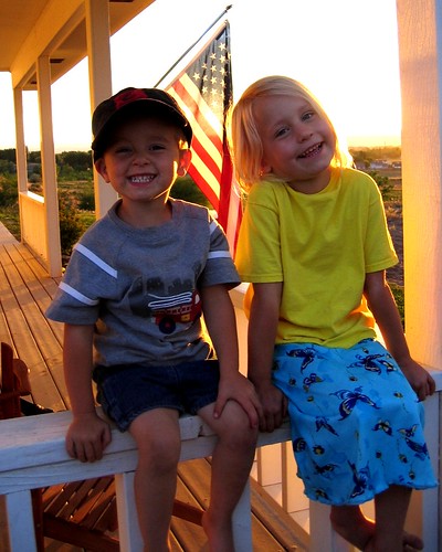 kid kids child children flag sunset porch happy sibling siblings brother sister smile youth american cute