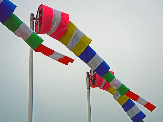 Colourful wind socks on the beach at the Belgian coast town of Knokke-Heist