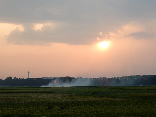 sunset rural smoke fields hanoi outskirts controltower