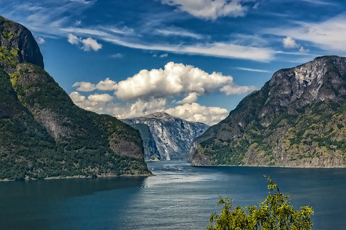 aurlandsvangen fjord norway blue contrast color colors colours colour clouds cloud hill hills landscape land mountain mountainscape nature outdoors outdoor panorama reflection rock rocks range sony sky sun scenic tree trees valley view wimvandem water mountainside green ripples summer “sonyflickraward 100149faves rockpaper simplysuperb