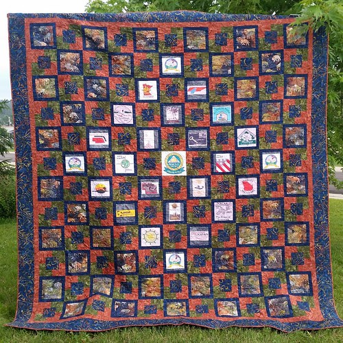 One last picture of the quilt before it heads to the convention.  Paul helped me hang it up.