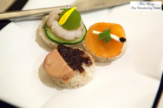 Canapés of cucumber and shrimp, smoked salmon with caviar