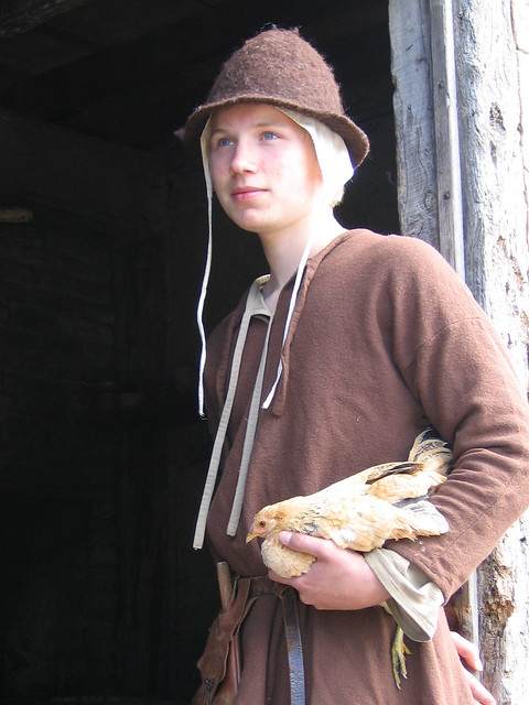 medieval boy with chicken from Flickr via Wylio