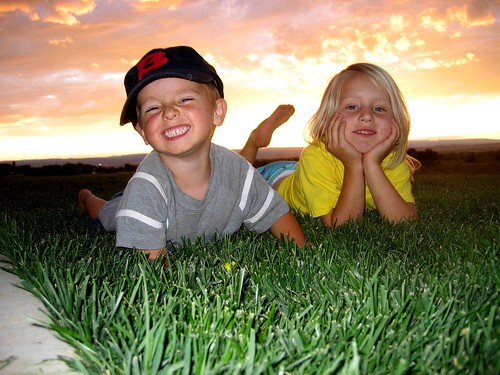 kid kids smile brother sister sunset child children grass posing portrait
