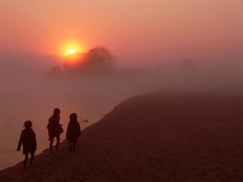 africa trip morning sunset orange sun water yellow sunrise river children three wakeup madagascar