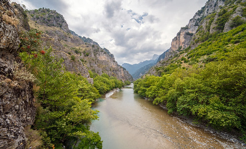 river aoos konitsa greece greek landscape scenery cloudy cloud grey summer green forest trees riverbed canyon storm view
