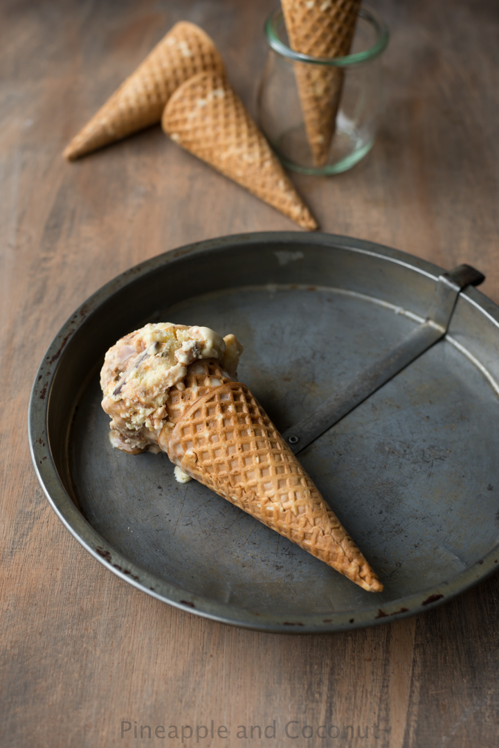 Tin Roof Ice Cream Cones - Rich vanilla ice cream swirled with chocolate fudge and caramel sauces and mixed with chocolate covered salty peanuts. www.pineappleandcoconut.com