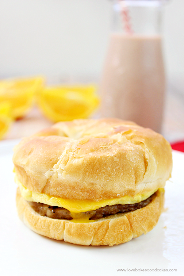 Jimmy Dean® Sausage, Egg & Cheese Croissant Sandwich with a glass of chocolate milk.