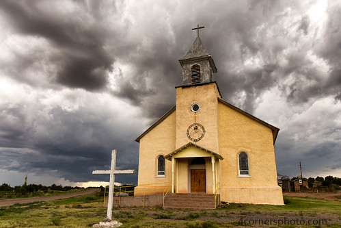 road summer sky newmexico color building church rain weather hail architecture clouds stairs rural religious us scenery cross unitedstates steeple adobe porch northamerica thunderstorm lightning grassland sacredheartcatholicchurch dilia guadalupecounty 4cornersphoto