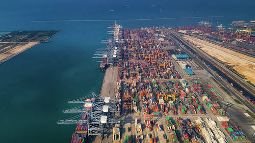 port container cargo china ship trade export shipping containers terminal transport singapore dock marine freight industry kong hong goods maritime business transportation commerce harbor delivery import boat logistics crane industrial sea white city loading storage truck laem chabang hub chonburi thailand fly sky top bird eye view drone air plane