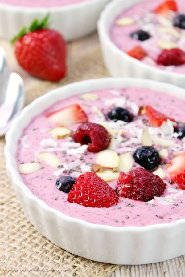 Mixed Berry Smoothie Bowls up close with fresh fruit.