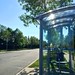 Bus stop in the sun