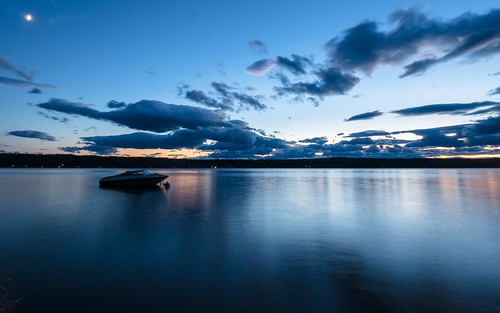 sunset sky lake reflection water mirror boat long peaceful zuiko afterglow 918mm