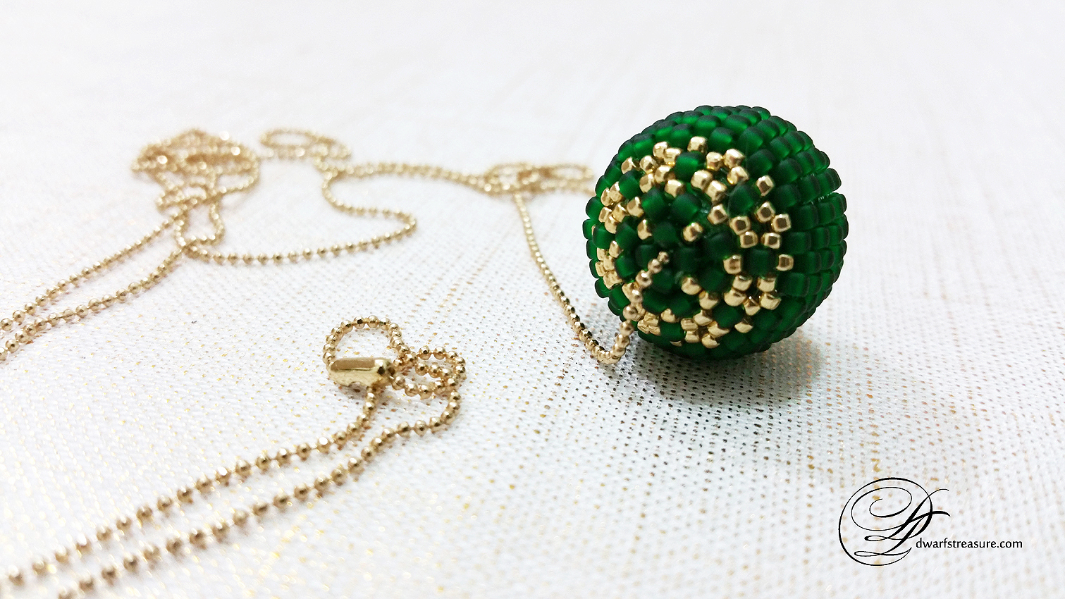long ball chain necklace with custom made emerald beaded ball pendant