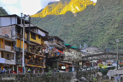houses people peru horizontal buildings outdoors town day small pueblo sunny jungle tropical machupicchu gettyimages endofday