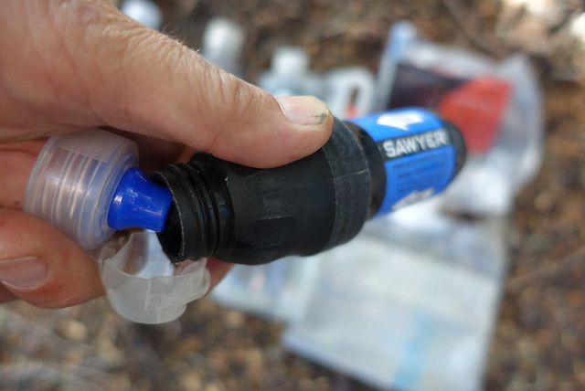 Smartwater sports bottle top as a Sawyer flusher