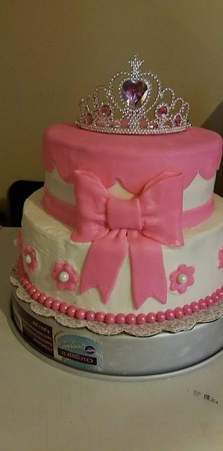 Princess tier vanilla cake with buttercream and fondant decorations by Glam n Stage Custom Party Creations