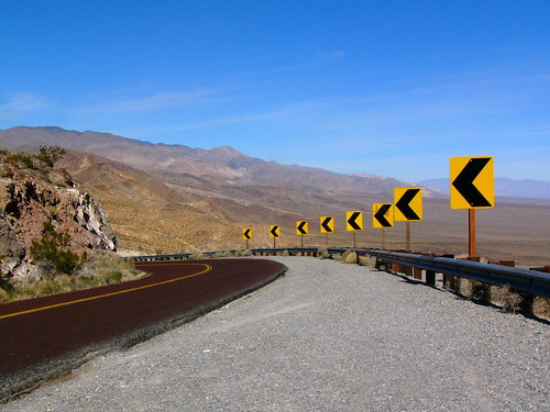 california road blue sky signs black yellow rocks view browns arrow californiadesert panamintrange
