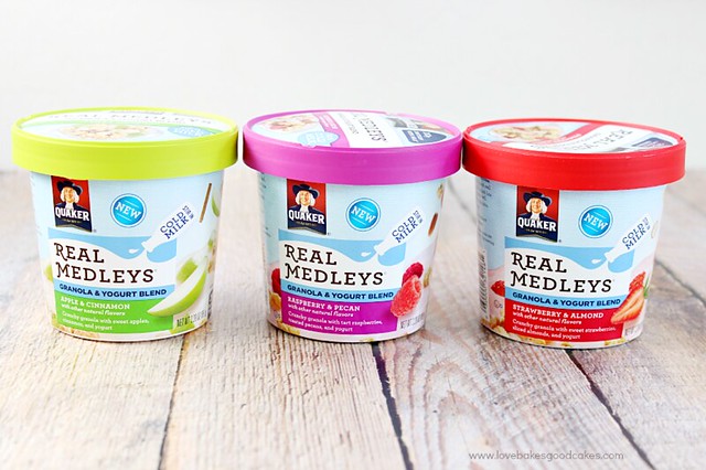Three containers of Quaker Real Medleys products.