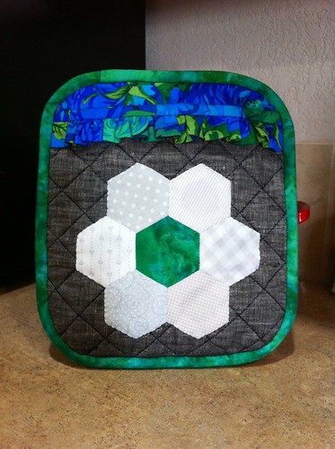Finally finished a potholder! It doesn't look exactly how I planned, but it is functional and relatively pretty.