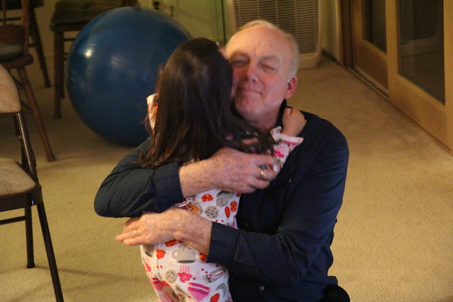 Mio hugging Grandpa