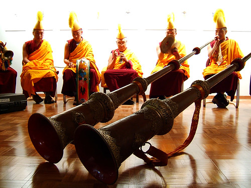 red white yellow horns monks tibetan thumbsup drepungloselingmonastery pujaceremony