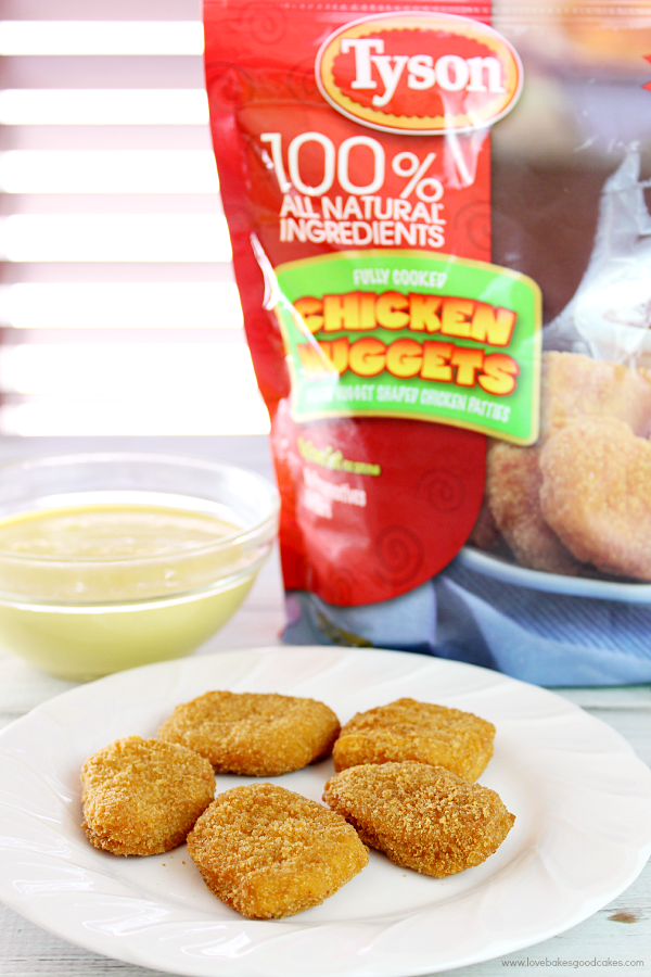 Chicken nuggets on a plate with Honey Mustard Dipping Sauce.