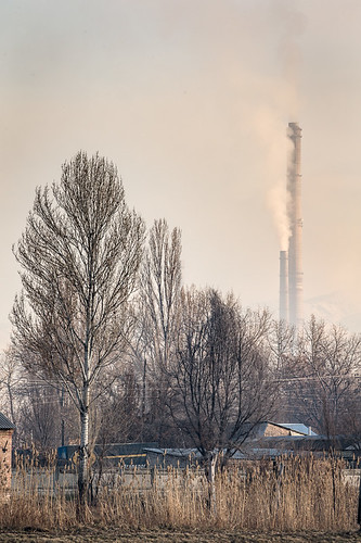 asia bishkek centralasia kyrgyzstan airpollution building energycreation grass land nature pollute polluted pollution powerplant roof scenery smog smokestack towers tree truck urbanlandscape