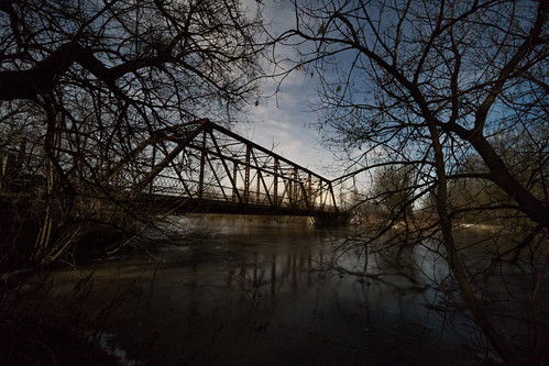 bright ontario canada ca bridge tree eerie river winter night ice frozen thaw flood truss