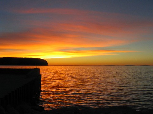 sunset wisconsin ellisonbay orange water doorcounty horizon horizontal sky wi midwest greenbay lakemichigan sunrise sun