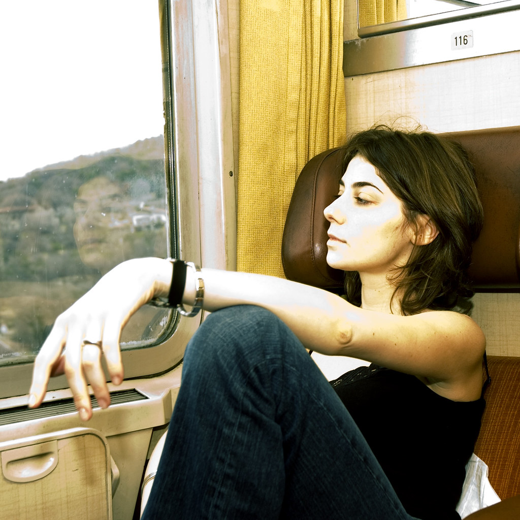 Thoughtful girl in train