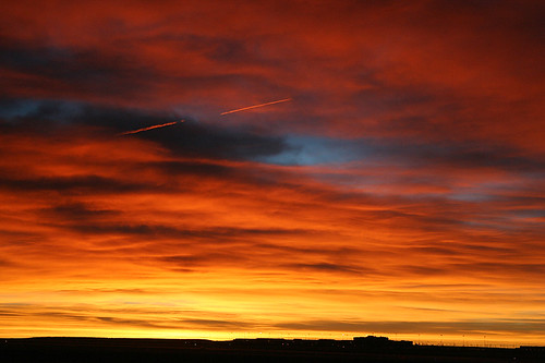 sunrise clouds cos coloradospringsairport colorado orange red blue dawn coloradosprings contrail fantastic