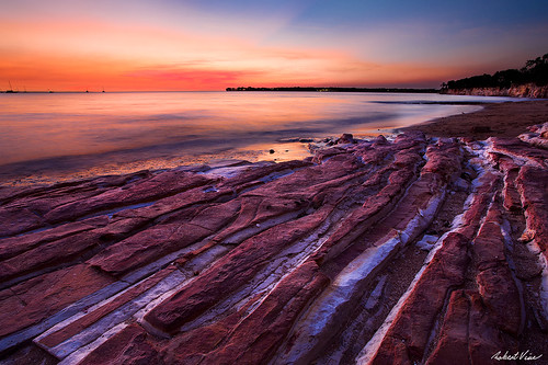 ocean sunset red sea orange beach water rocks pattern au magenta australia cliffs northernterritory fanniebay