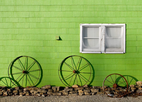 wheel lime green wall window white gravel flat small town monticello wisconsin shingle pattern shadow abstract color colour wonderful wi greencounty outdoors stockphotography stockphoto greenwall building buildingexterior monticellowisconsin colorfulwall colorimage horizontal wagonwheels rusty metal againstthewall three 3 thenumberthree house home residence smalltown vividcolors shingles siding midwest lighting painted paint landscaping shadows oldhouse side spokes rural nonurbanscene bright copyspace composition toddklassy wisconsinphotographers old ramshackle rustic provincial simple unsophisticated rims wheelrims antique oldandnew kitsch alley backalley story