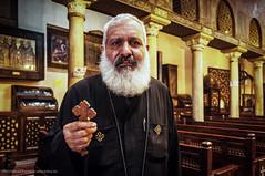 Priest with a Cross