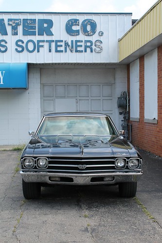 flint michigan urban city summer august 2015 hometown east side 425 sdorthwy dort 1969 chevrolet chevy chevelle ss396 2door hardtop coupe black classic american muscle car generalmotor gm abody intermediate midsize front view face garage chrome laboratory