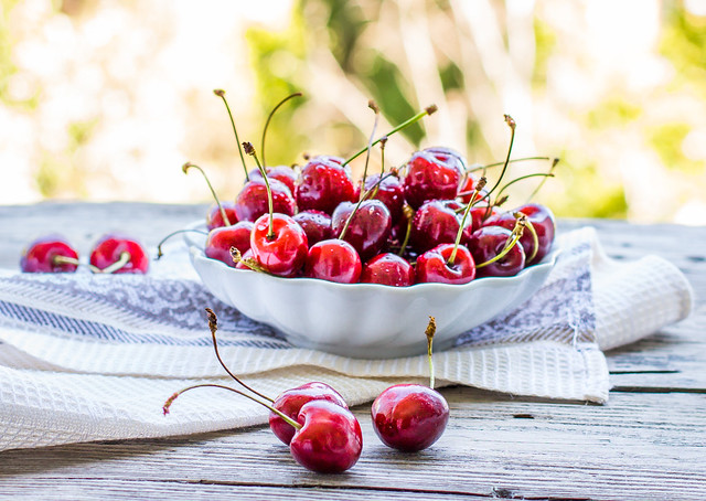 fresh red cherry in a plate,healthy snack, summer, selective focus
