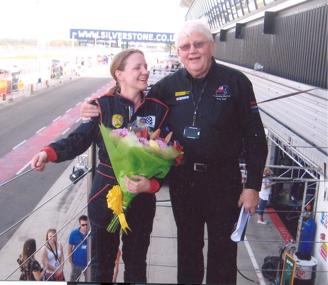 Emma Karwacki became our second woman champion in 2011 with her 147. She celebrates at Silverstone with Brian Jones.