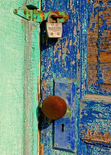 door old light sky color colour classic beautiful vertical wisconsin landscape outdoors design rust peeling paint lock decay fineart entrance vision argyle knob keyhole wi smalltown stockphoto artistry stockphotography royaltyfree rightsmanaged getouttatown