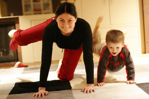 mother and son practice pilates for pregnancy
