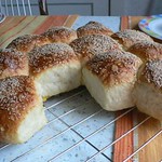 Make-ahead buttered poppy seed rolls