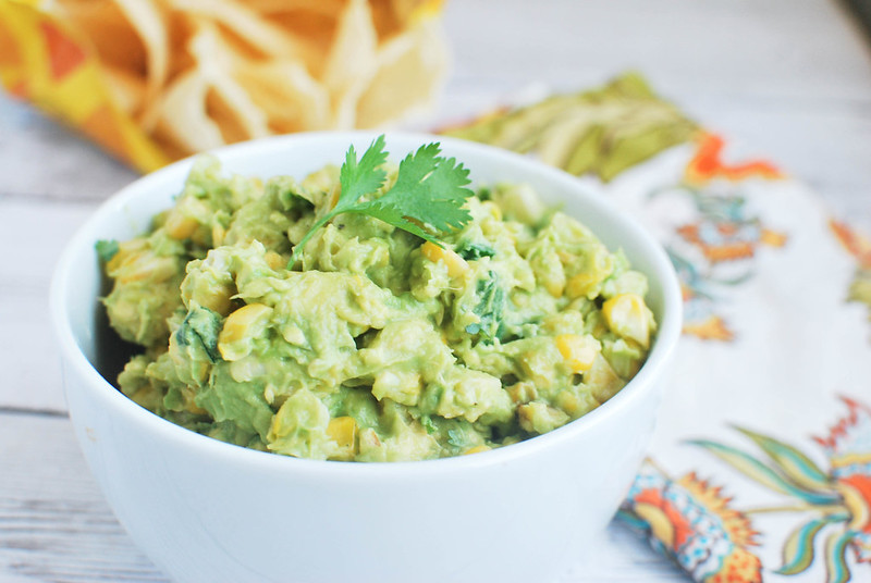 Grilled Corn Guacamole - an easy homemade guacamole recipe with some grilled corn mixed in. Perfect for summer!