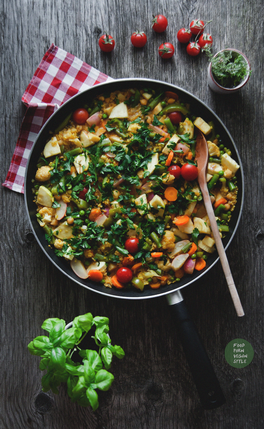 Vegan paella with summer vegetables and millet