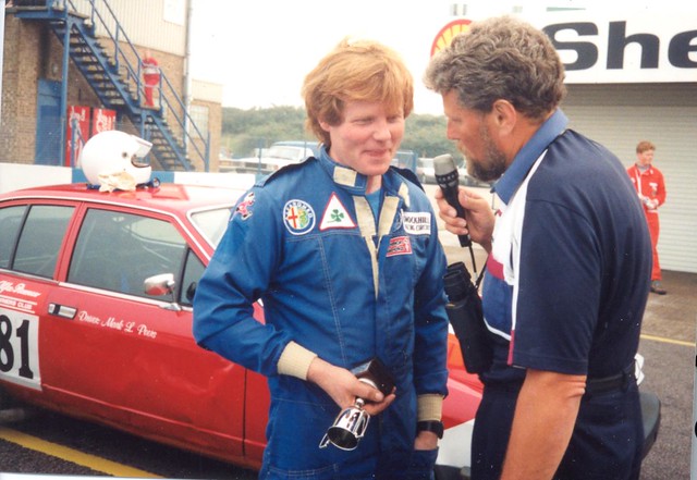 1993 Champion Mark Peers (Alfetta GTV) talks to Andrew Wilkins after another class win.