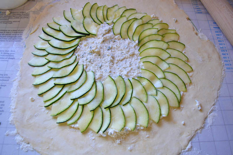 A summery take on a simple and rustic zucchini tart. Zucchini galette is perfect to use up the abundance of summer produce and has a flaky, buttery crust.
