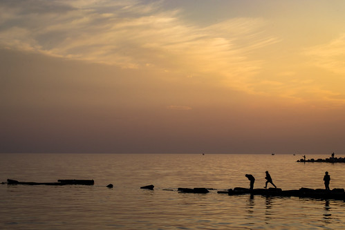 sunset sea silhouette clouds children play jetty greece gr neamoudania makedoniathraki